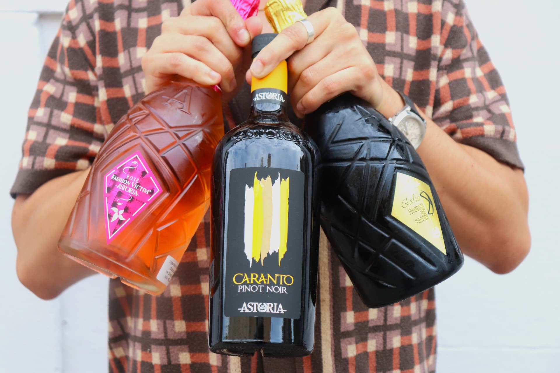 Three bottles of wine held together