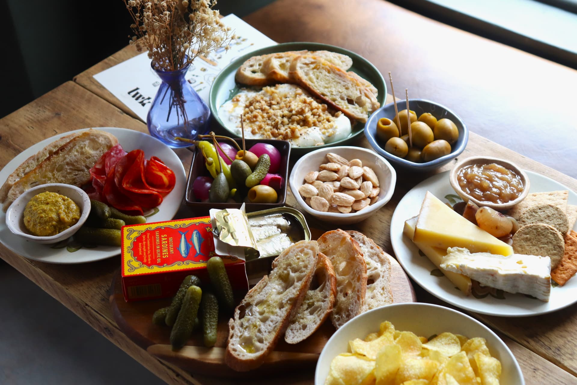 A table filled with sharing plates and snacks